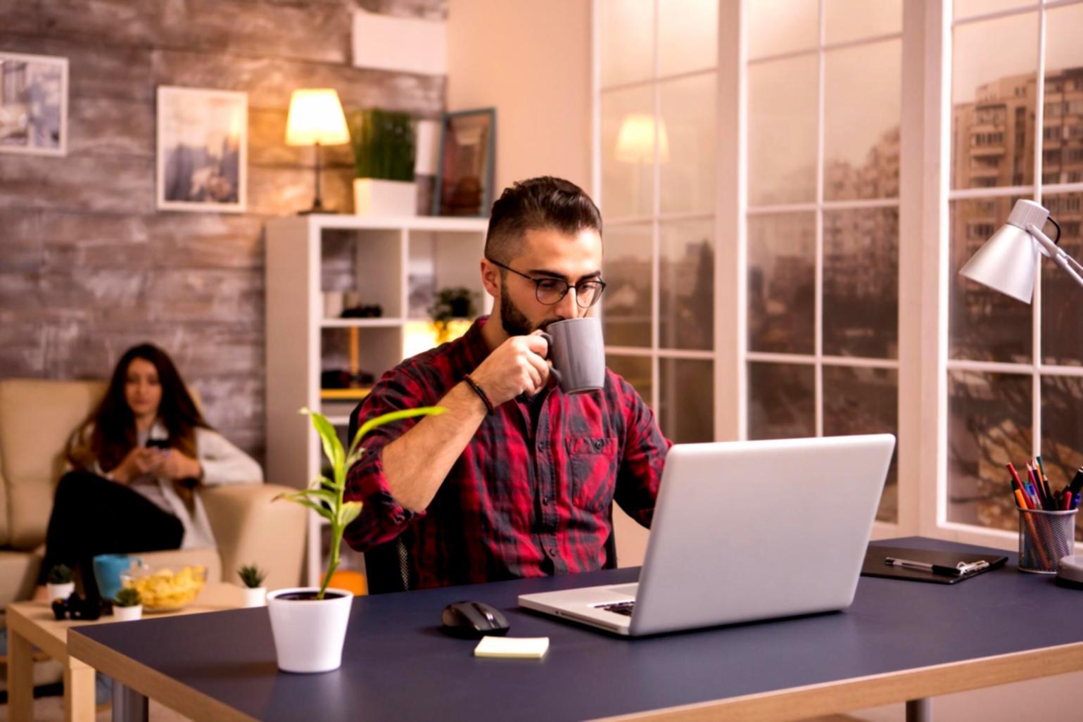 Business owner reviewing financial reports and planning strategy